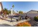 Private backyard features a refreshing pool, patio seating, and desert landscaping at 3403 E Kristal Way, Phoenix, AZ 85050