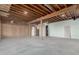 Large unfinished basement with concrete floors and exposed ceiling at 36923 N 31St Ave, Phoenix, AZ 85086