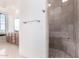 Bathroom features a tiled shower, granite counter tops and a mountain view at 36923 N 31St Ave, Phoenix, AZ 85086