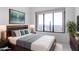 Staged bedroom with a mountain view and neutral colors is move-in ready at 36923 N 31St Ave, Phoenix, AZ 85086