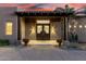 Double front doors, desert flowers, and lights at 36923 N 31St Ave, Phoenix, AZ 85086