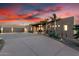 Single story home with desert landscaping, three-car garage and covered front porch at 36923 N 31St Ave, Phoenix, AZ 85086