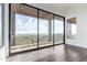 Sliding glass doors open to mountain views in this bright open-concept living space at 36923 N 31St Ave, Phoenix, AZ 85086