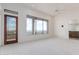 Bright main bedroom features mountain views, light-colored carpet and access to the outside at 36923 N 31St Ave, Phoenix, AZ 85086
