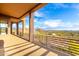 View of the outdoor patio that shows a natural desert landscape and blue sky at 36923 N 31St Ave, Phoenix, AZ 85086
