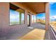 An outside patio shows views of the desert landscape and blue sky at 36923 N 31St Ave, Phoenix, AZ 85086