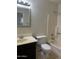 Functional bathroom featuring a vanity sink, toilet, and bathtub with shower at 4424 E Pueblo Ave, Phoenix, AZ 85040