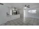 Well-lit kitchen with modern fixtures, stainless steel appliances, and tile flooring at 4716 W State Ave, Glendale, AZ 85301