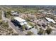 Aerial view showing a modern house with a rooftop patio, pool, and well-manicured grounds at 4725 N 56Th St, Phoenix, AZ 85018