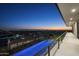 Expansive balcony showcases stunning city views, a putting green, and a refreshing pool for luxurious outdoor living at 4725 N 56Th St, Phoenix, AZ 85018