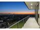 Balcony with city views stretching to the horizon, showcasing the beautiful sunset at 4725 N 56Th St, Phoenix, AZ 85018