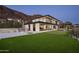 Luxury home exterior featuring a putting green, and attached garage at 4725 N 56Th St, Phoenix, AZ 85018