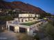 Stunning modern home featuring a rooftop deck, putting green, pool, and mountain views at 4725 N 56Th St, Phoenix, AZ 85018