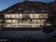 Evening shot of an outdoor pool and living area of the home at 4725 N 56Th St, Phoenix, AZ 85018