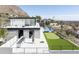 Modern two-story home featuring an outdoor kitchen, putting green, pool and city views at 4725 N 56Th St, Phoenix, AZ 85018