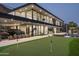 Beautiful modern home featuring a putting green, pool, car port, and mountain views at 4725 N 56Th St, Phoenix, AZ 85018