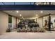 Spacious garage area featuring a black Porsche and Hummer at 4725 N 56Th St, Phoenix, AZ 85018