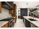Stylish kitchen featuring high-end stainless steel appliances, a marble backsplash, and an open design at 4725 N 56Th St, Phoenix, AZ 85018