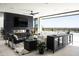 Bright living room featuring modern furniture, a fireplace, and panoramic views of the city and mountains at 4725 N 56Th St, Phoenix, AZ 85018