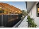 Modern home featuring a walkway, desert landscaping, and mountain views at 4725 N 56Th St, Phoenix, AZ 85018