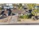 Charming single-story home featuring a two-car garage, front yard, and mature landscaping at 556 W Kiva Ave, Mesa, AZ 85210