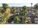 Overhead view of the neighborhood with mature trees, private pool and fenced in backyard at 556 W Kiva Ave, Mesa, AZ 85210