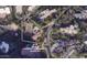 Aerial view of large private estate including large luxury home, tennis court, guest house and pool at 5648 N Superstition Ln # 5, Paradise Valley, AZ 85253
