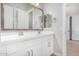 Bathroom boasting a double vanity with white cabinets and modern fixtures at 5741 E Star Valley St, Mesa, AZ 85215