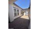 Private courtyard features stone pavers and a seamless transition between indoor and outdoor living spaces at 5741 E Star Valley St, Mesa, AZ 85215