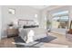 Serene main bedroom featuring a plush bed, soothing colors, and ample natural light creating a relaxing retreat at 5741 E Star Valley St, Mesa, AZ 85215