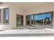 Covered patio with multiple sliding doors and a concrete floor at 5741 E Star Valley St, Mesa, AZ 85215