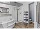 Bright bathroom features a glass enclosed shower and a relaxing soaking tub at 586 E Stirrup Ln, San Tan Valley, AZ 85143