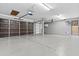Spacious three car garage with automatic door openers and access to the backyard at 586 E Stirrup Ln, San Tan Valley, AZ 85143