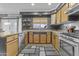 Bright kitchen featuring stainless steel appliances and spacious countertops at 586 E Stirrup Ln, San Tan Valley, AZ 85143