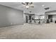 Spacious loft area with natural light and access to additional rooms at 586 E Stirrup Ln, San Tan Valley, AZ 85143