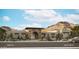 Stunning modern home featuring a stone archway entrance, desert landscaping, and mountain views at 6602 N 40Th St, Paradise Valley, AZ 85253