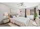 Serene bedroom featuring a king-size bed, neutral tones, and ample natural light at 6990 E 6Th St # 1016, Scottsdale, AZ 85251
