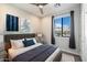 Tranquil bedroom with an outdoor view, decorative prints, and a plush rug at 6990 E 6Th St # 1016, Scottsdale, AZ 85251