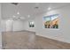 Bright living room with recessed lights, neutral paint, and updated flooring at 701 W Windsor Ave, Phoenix, AZ 85007