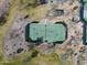 Aerial shot of the tennis court showcasing the community's recreational facilities and outdoor lifestyle at 8057 E Greythorn Dr, Gold Canyon, AZ 85118