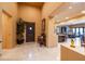 Inviting foyer with tile floors, high ceilings, and decorative accents welcomes you home at 8057 E Greythorn Dr, Gold Canyon, AZ 85118