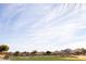 Scenic golf course featuring manicured greens, sand traps, and expansive desert views at 8057 E Greythorn Dr, Gold Canyon, AZ 85118