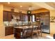 Open kitchen with stainless steel appliances and granite countertops at 8057 E Greythorn Dr, Gold Canyon, AZ 85118