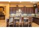 Kitchen featuring stainless steel appliances, granite countertops, and custom cabinets at 8057 E Greythorn Dr, Gold Canyon, AZ 85118