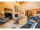 Open concept living room with fireplace at 8057 E Greythorn Dr, Gold Canyon, AZ 85118