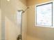 Close-up of a shower with tiled walls and a detachable shower head at 8057 E Greythorn Dr, Gold Canyon, AZ 85118
