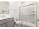 Bathroom featuring a glass enclosed shower, gray vanity, and neutral wall paint at 8255 N 22Nd Dr, Phoenix, AZ 85021