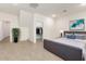 Main bedroom with neutral colors, recessed lighting, tile floor, walk-in closet, and stylish decor at 8255 N 22Nd Dr, Phoenix, AZ 85021