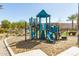 Community playground area with modern blue and green play equipment, a slide, and a climbing structure at 8255 N 22Nd Dr, Phoenix, AZ 85021