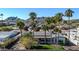 Overhead view of the home showcasing desert landscaping, mountains, palm trees, and privacy wall at 9821 N 29Th Pl, Phoenix, AZ 85028